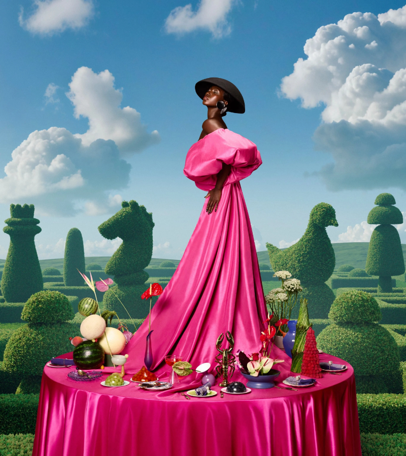 Surreal soirees Pinterest trends in 2025 showing woman in a hot pink gown surrounded by chess piece garden hedges. 