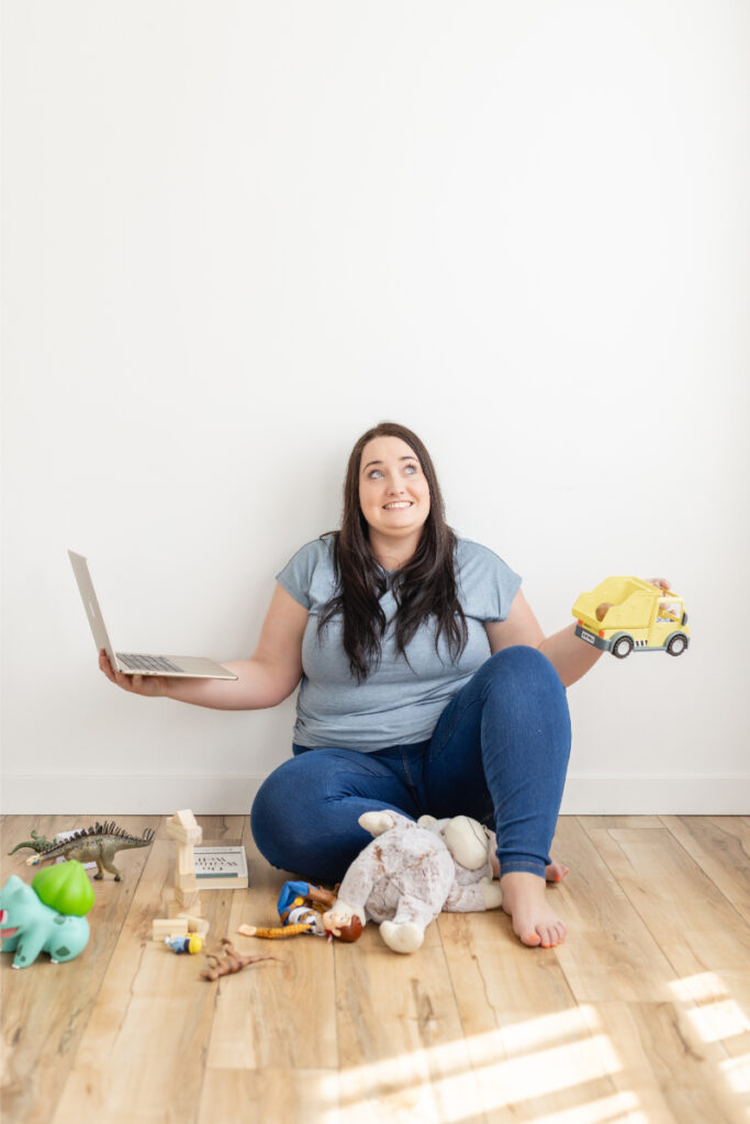 Kara from the Kara Report juggles laptop and being a mom while she discusses how to create a blog-to-podcast strategy for building multi-platform content.